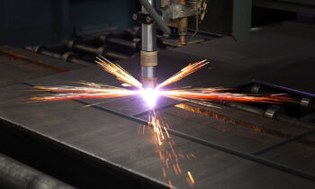 Industrial cnc plasma machine cutting of metal plate
